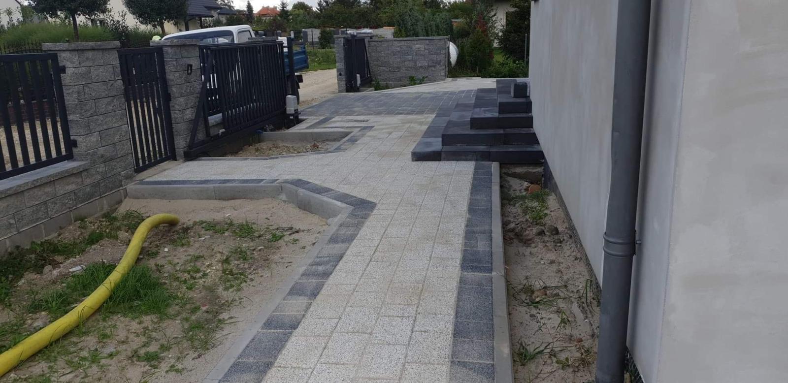 Układanie kostki brukowej – podjazd z wzorem spirali, realizacja Długołęka i okolice Wrocławia